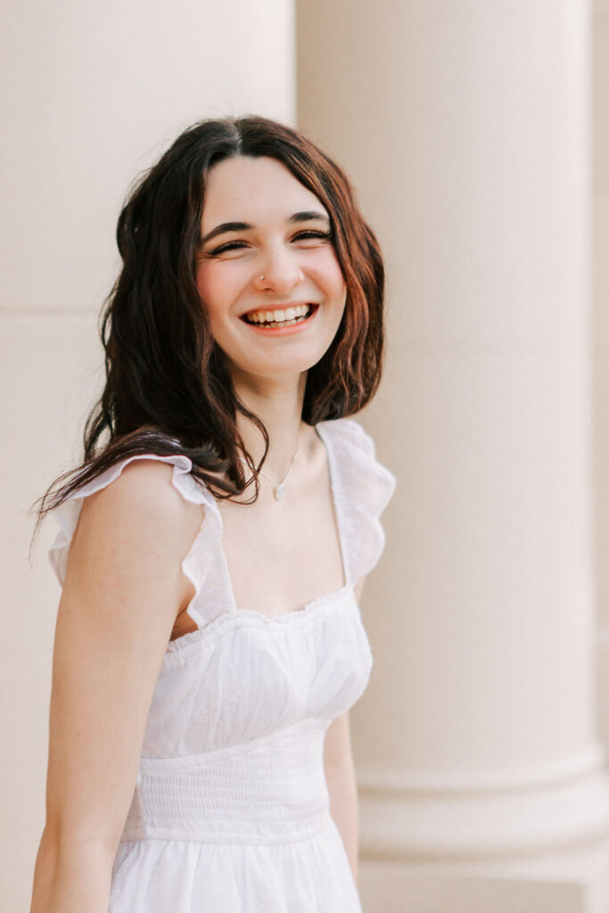 High school senior poses for senior photos downtown Albany Oregon